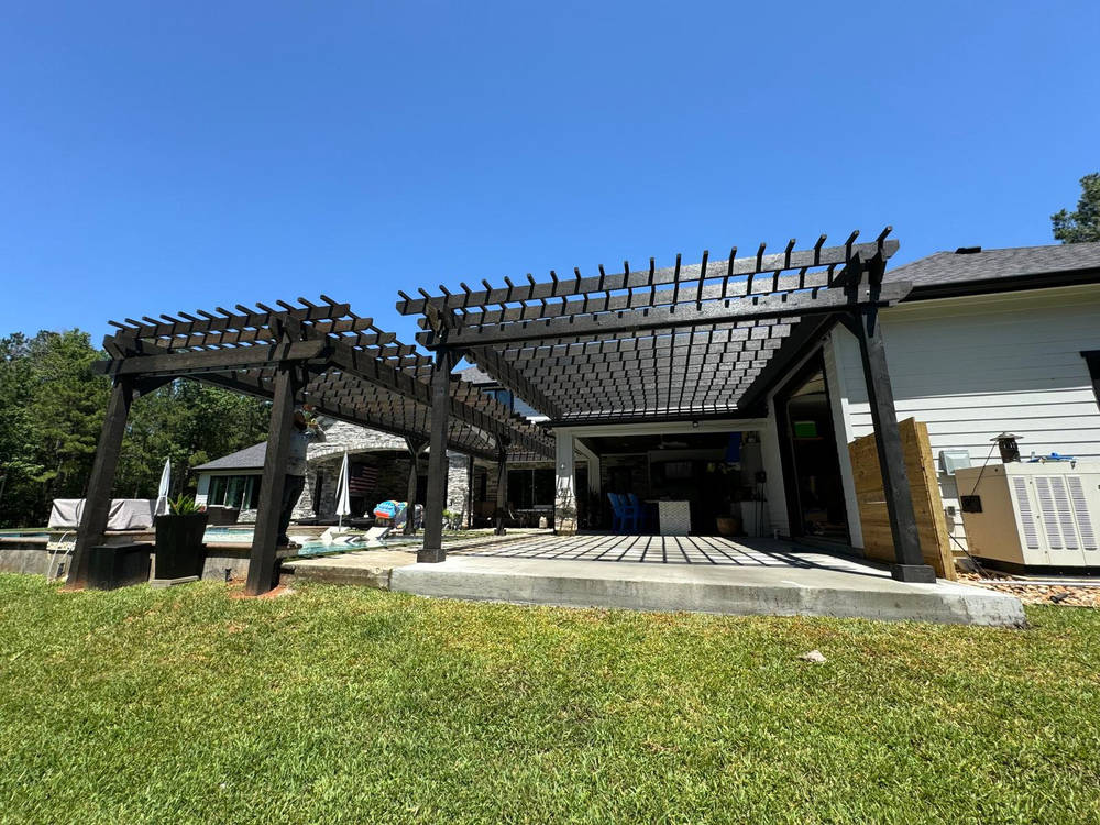 Beautiful custom patio cover with outdoor kitchen built for a Katy homeowner