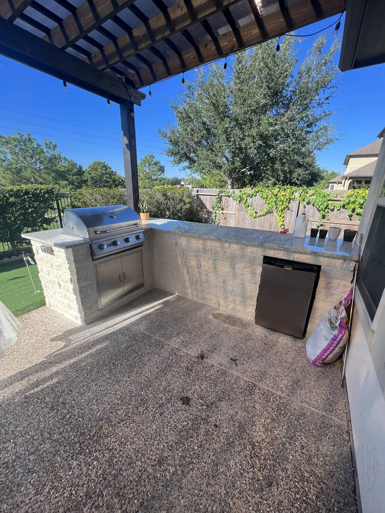 Completed patio cover project showing quality craftsmanship in Katy, Texas