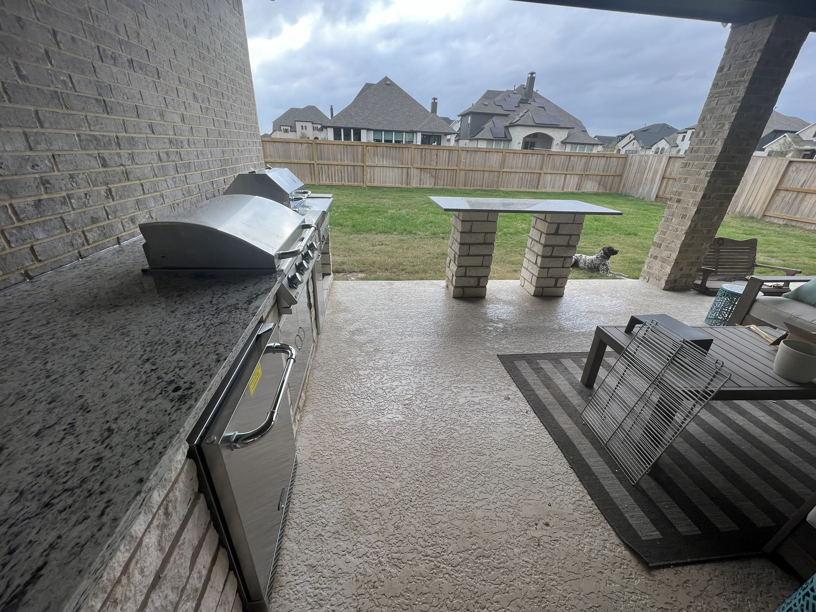 Wood pergola and outdoor kitchen in Fulshear, TX